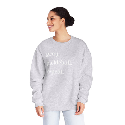 Pray, pickleball, repeat Unisex NuBlend® Crewneck Sweatshirt